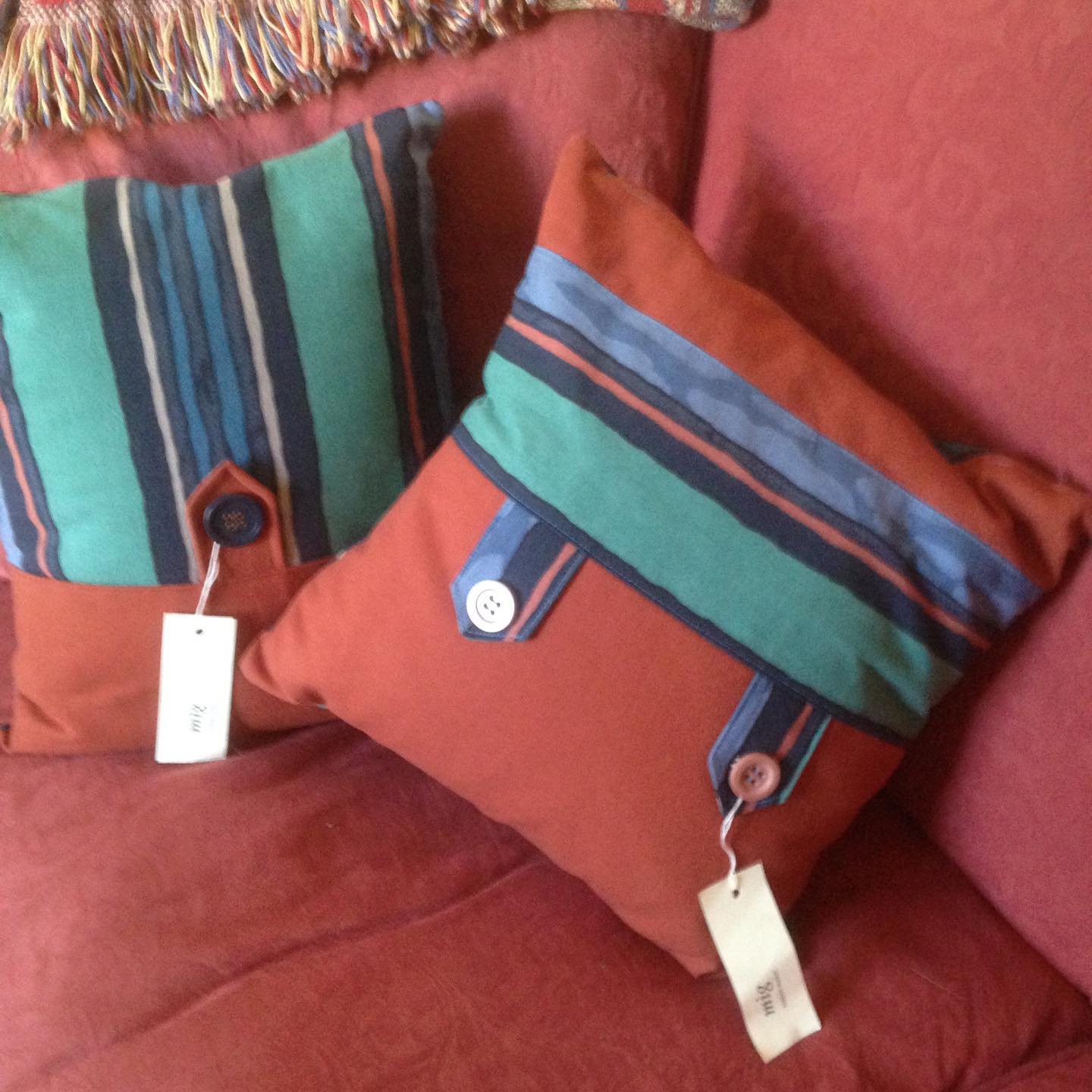 Handmade cushions from recycled curtains